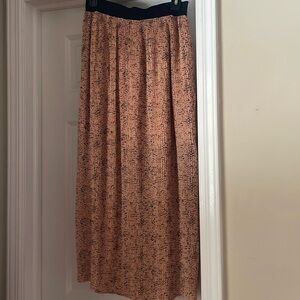 bar III Brand. Long skirt apricot with black pattern black elastic waist band